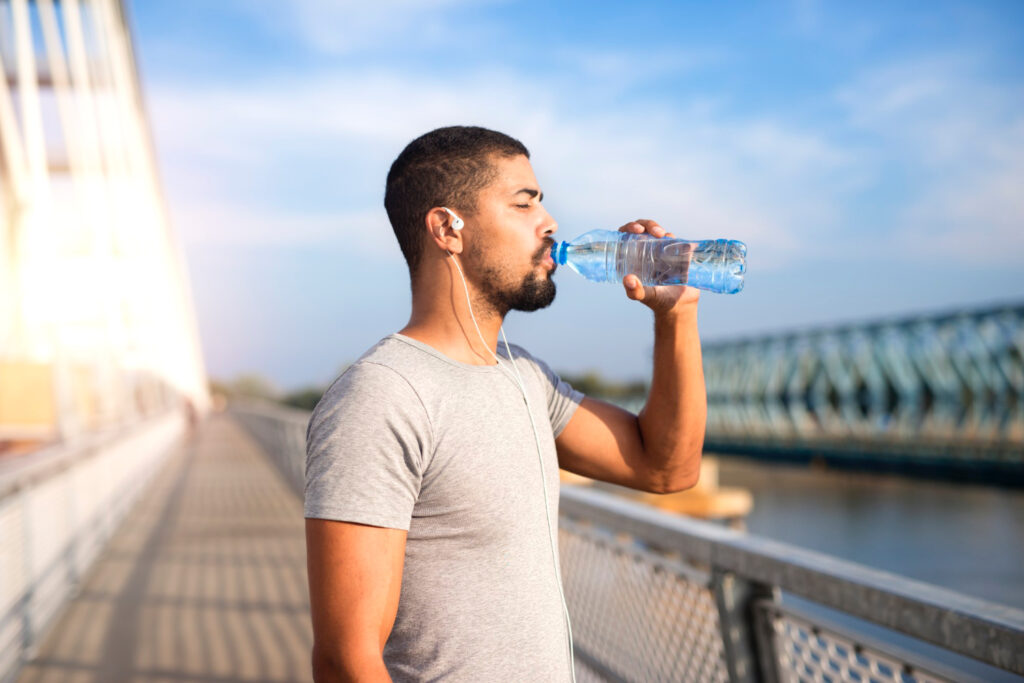 Importance of hydration a man drinking water 